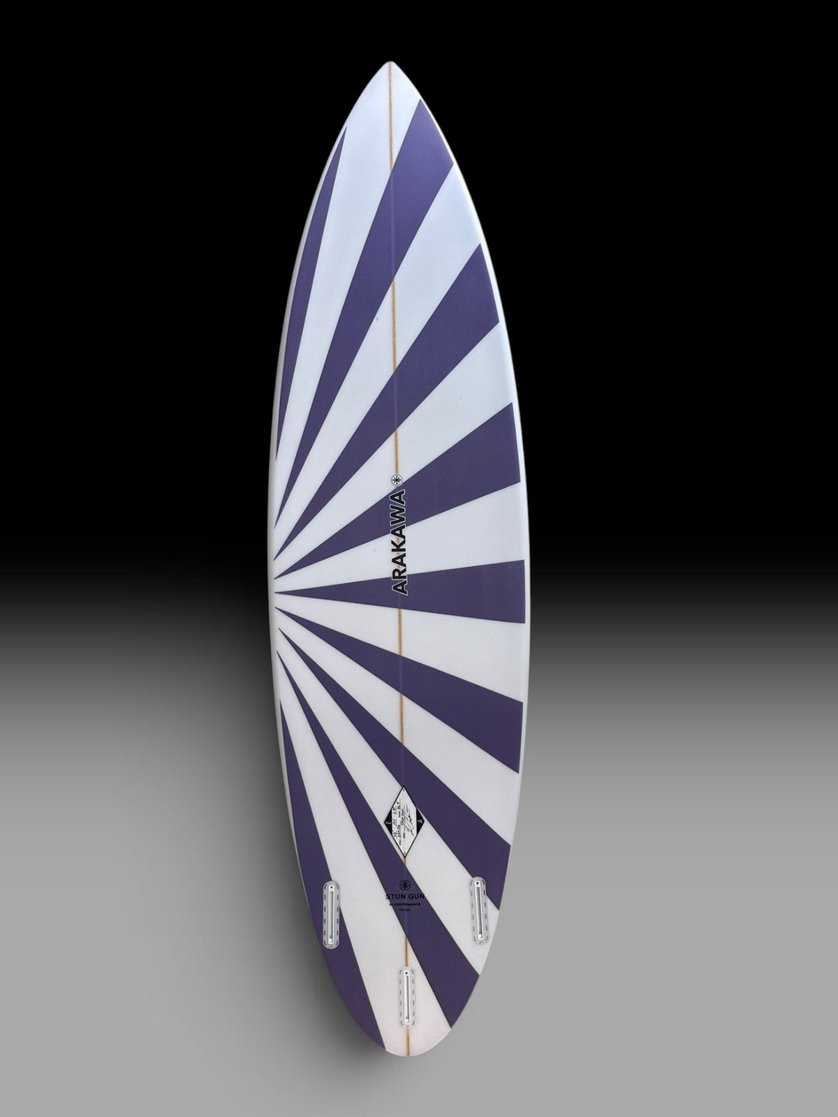 Arakawa Stun Gun 6'6 surfboard – bottom view, purple sunburst spray