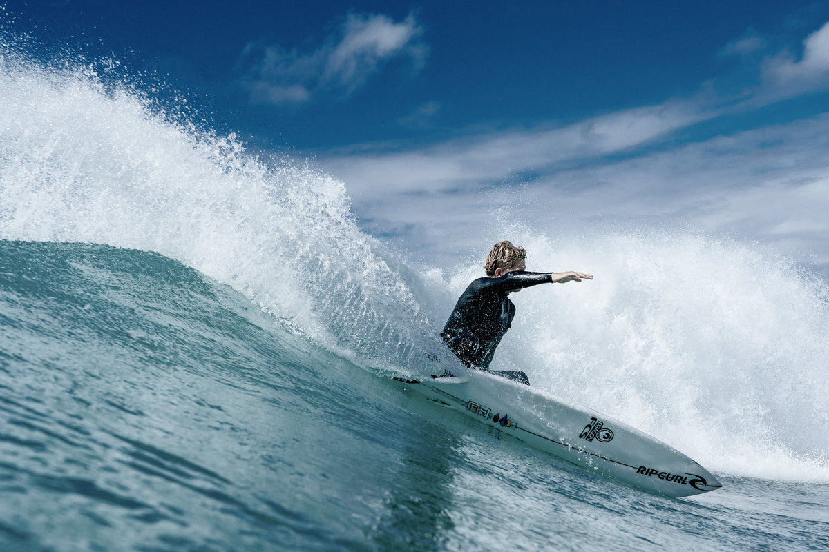 Surfer carving a Sharp Eye surfboard – SA's most-ridden Sharp Eyes